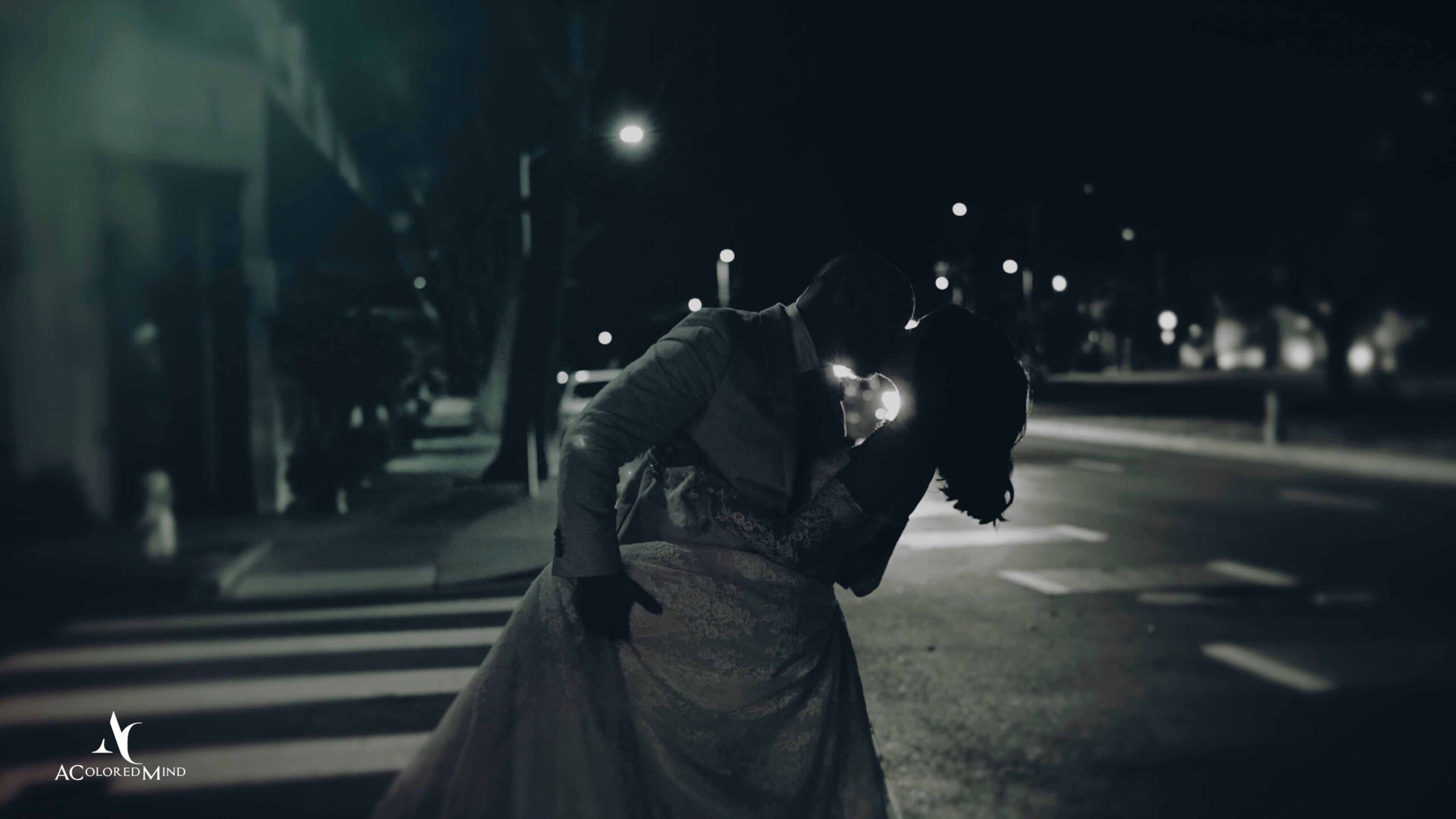 Bride and groom sharing a romantic night portrait outside Il Cielo Beverly Hills wedding venue